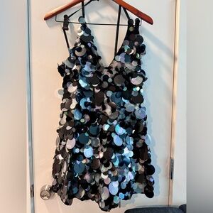 Halterneck romper with large disc embellishments